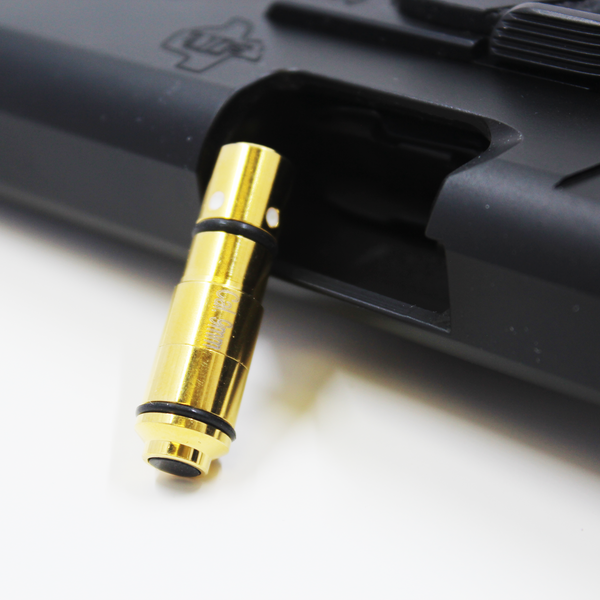 Close Up of 9mm Laser Cartridge Outside of Handgun Chamber - Mantis